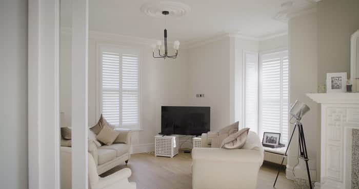 Living Room Shutters Full Height with Midrail Divide