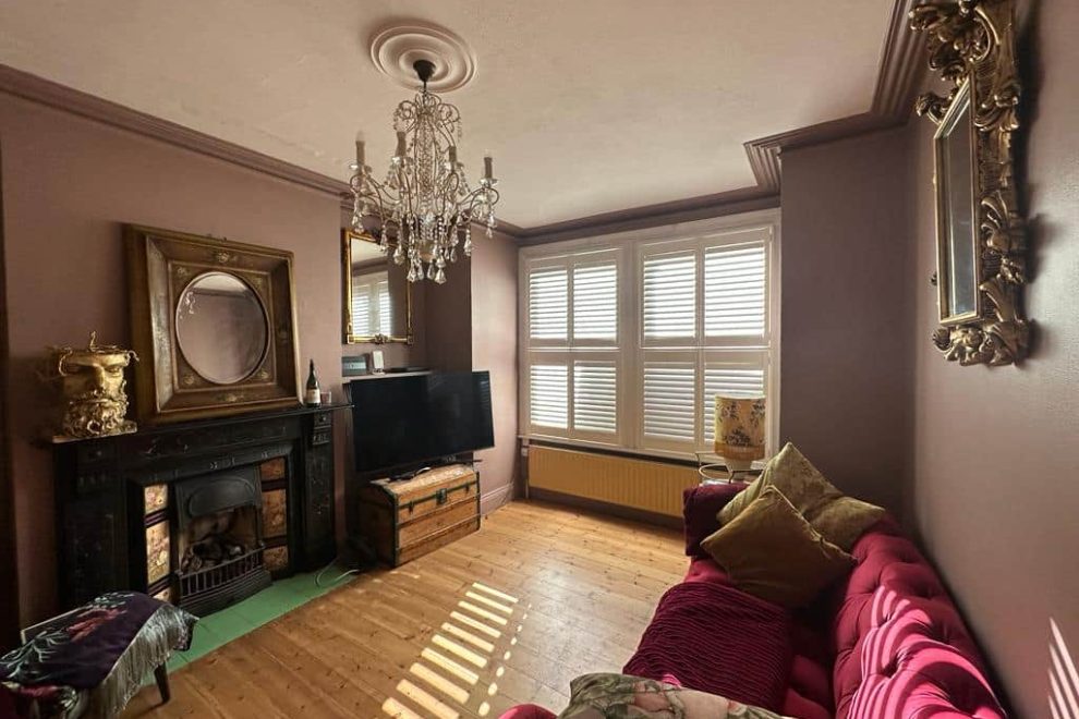 Perfect living room with window shutters