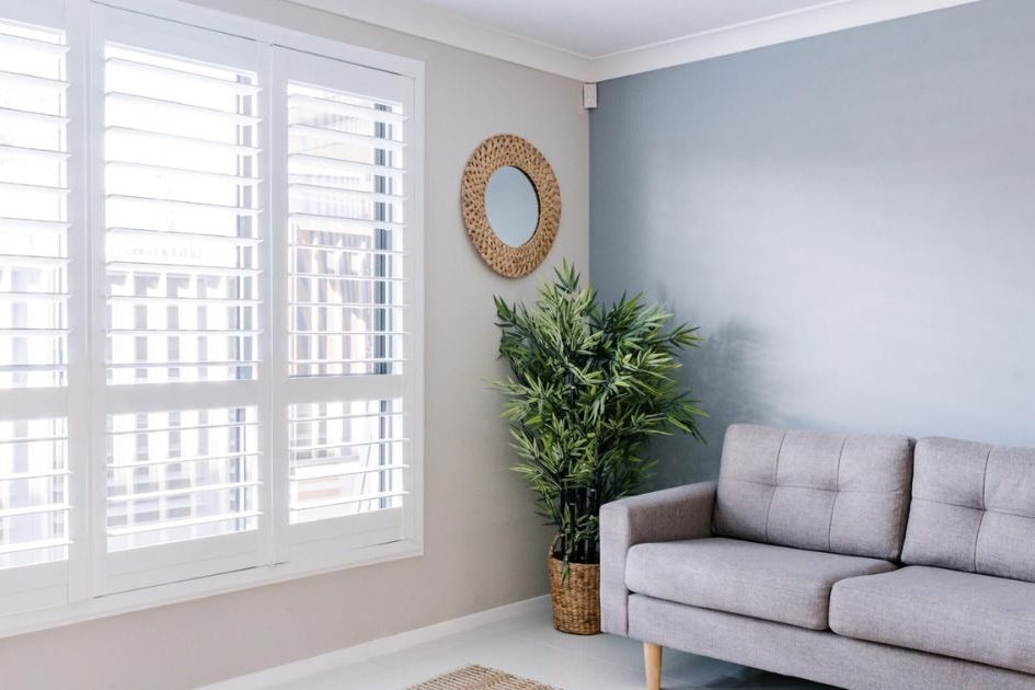 living room with window shutters